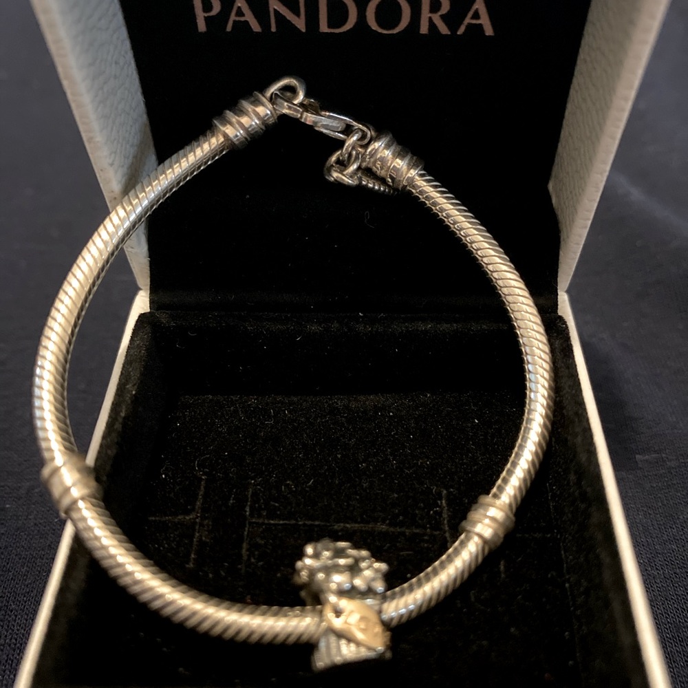 6” Pandora bracelet and flower love charm.